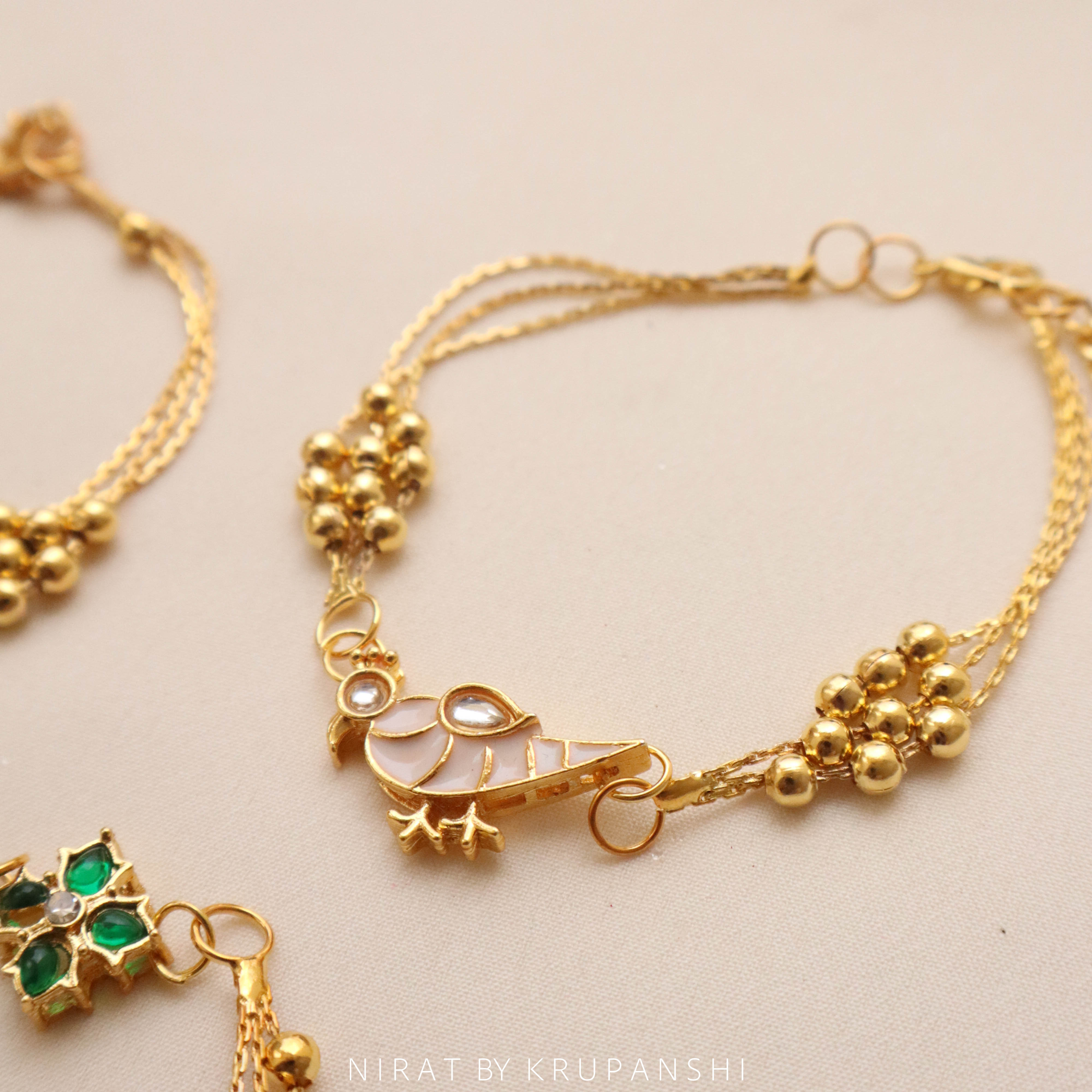 Suvarn Bindu Rakhi / Bracelet