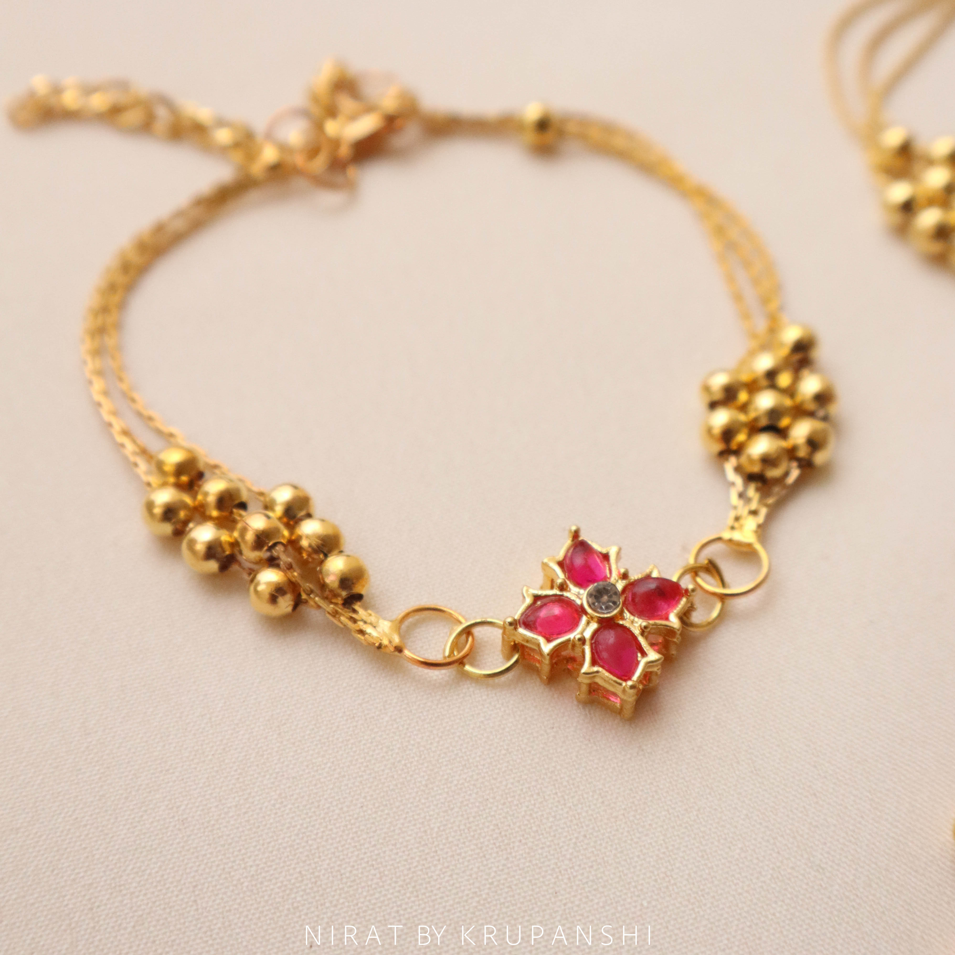 Suvarn Bindu Rakhi / Bracelet